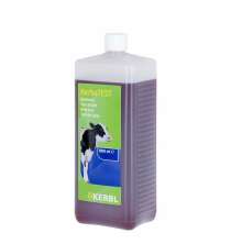 Transparent flaska med mrkt innehll, samt en grn etikett med CMT vtska